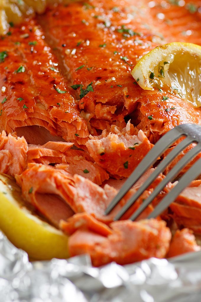 Oven-baked Honey Garlic Salmon wrapped in aluminum foil.