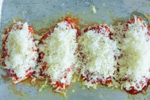 Chicken with parmesan on top.