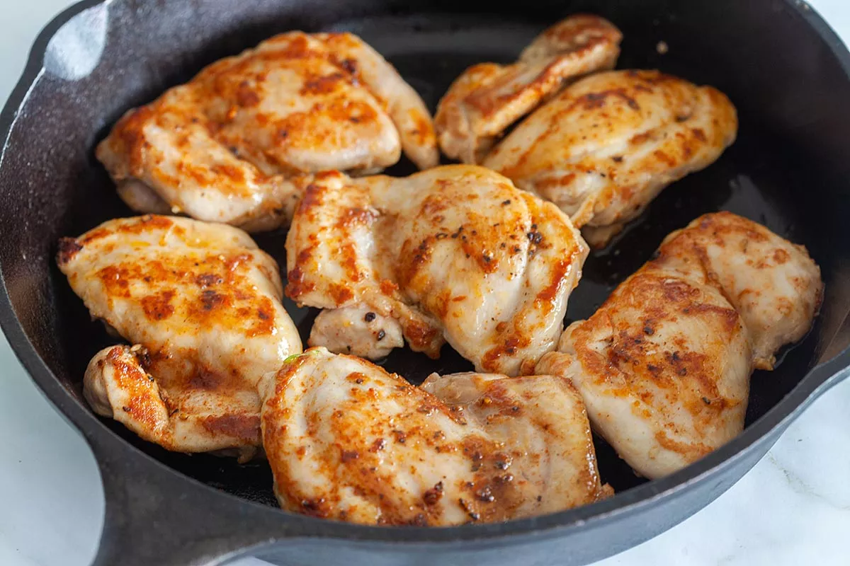 cook chicken with pan.